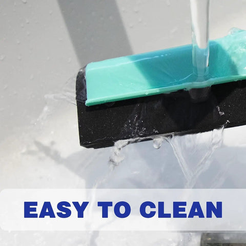 Light Duty Floor Squeegee With 43 Inch Adjustable Aluminum Handle being rinsed under water for easy cleanups