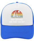 Blue and white trucker hat with 'No Crying on the Yacht' text and rainbow sailboat graphic on front panel.