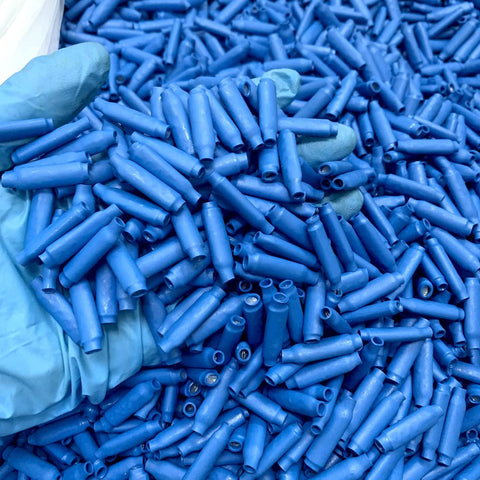 Blue Gel Filled Wire Splice Connectors 100Pcs Pack, Silicone Moisture Barrier, Waterproof Outdoor Ready in gloved hand