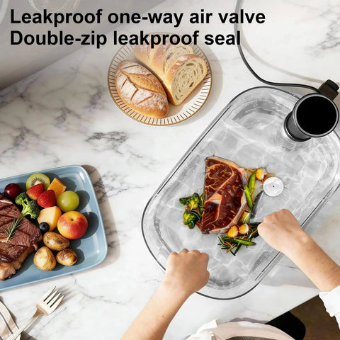 Person sealing meat in Reusable Vacuum Seal Bags 50pc With Clips 3 Sizes M L XL For Meal Prep Storage on countertop