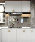 Modern kitchen with Champagne Bronze Cabinet Pulls 3 Inch 76mm Set Of 10 Kitchen Cabinet Handles on white cupboards.
