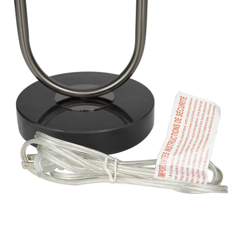 Oval Shaped Metal Table Lamp For Living Room with black iron base, marble accents, and cord, modern minimalist design