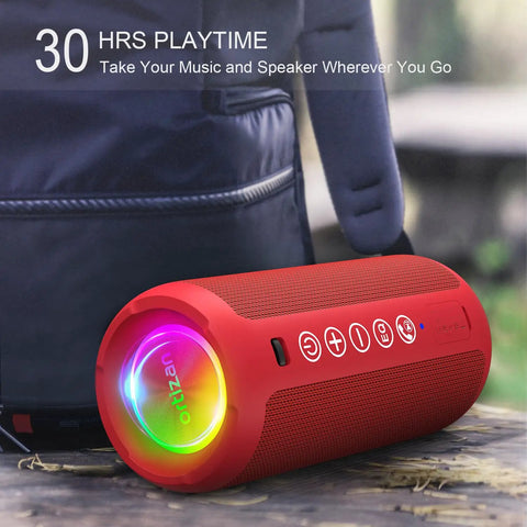 Red 24W Bluetooth Speaker With Deep Bass And Dual Pairing, IPX7 Waterproof, Bluetooth 5.3, LED Lights on wooden surface