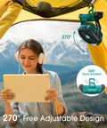 Rechargeable Portable Fan With 20000mAh Battery hanging in a tent, 270-degree rotation feature, with person using tablet outdoors.