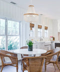 Four Light Wood Beaded Boho Farmhouse Pendant Chandelier With Tassels In White Rustic Bohemia Style in kitchen setting