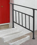 Rock-Solid 4-Step Steel Stair Railing with Integrated Fence Safety Barrier Features Tough Baked-On Finish for Indoor Outdoor Porch Deck Heavy-Duty Handrail mounted by red door.