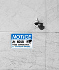 Heavy Duty Video Surveillance Sign 4 Pack 7x10 Inch Reflective Aluminum Security Camera Warning Decal mounted on wall