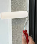 Polyurethane Sponge Paint Roller Set High Density for Walls and Detail Work Offering No Drip Performance With Game Changing Coverage For Latex And Acrylic Paints Sturdy Design Reduces Fatigue And Nails Every Edge, applying paint near a window.