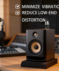 Top Grade Acoustic Isolation Pads For Five Inch Studio Monitor Speakers Featuring Dead Quiet Sound Dampening And Rock Solid Vibration Control For A Tighter Audio Mix with black monitor speaker on isolation pad.