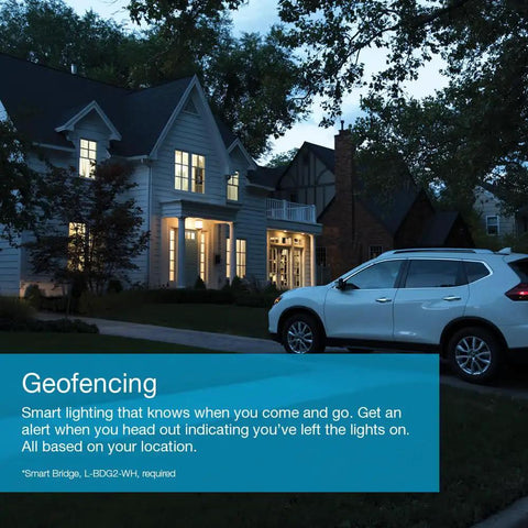 House exterior at dusk with car in driveway, showcasing Smart Light Switch Three Way Kit With Pico Remote And Wall Plate.