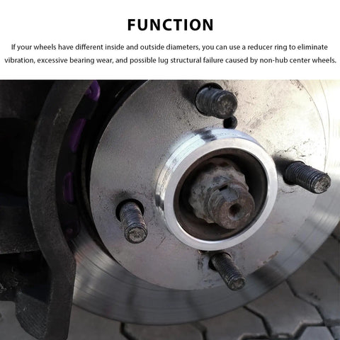 Close-up of 4 Pack Hub Centric Rings 67 To 73mm Wheel Center Bore Adapters Aluminum Alloy on brake rotor, reducing vibration.
