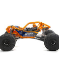 RBX10 Ryft 4WD Brushless RC Rock Bouncer Ready To Run Beast On The Trail With Solid Front And Rear Axles Rugged Tube Chassis 4S Capable Powertrain Licensed Raceline Wheels Battery And Charger Not Included side view