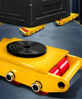 Heavy Duty Industrial Roller Skates For Moving Tonage Loads With 360 Degree Swivel Base And Non Slip Tray on warehouse floor.