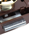 Close-up view of Cabinet Push Button Latch Keyless Cupboard Lock with smooth finish, brown base, and gold color.