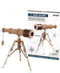 3D Wooden Puzzle Model Building Kit For Adults, DIY Wood Monocular Telescope Kit With Seaspray Pattern And Leather Nameplate, assembled on tripod beside box