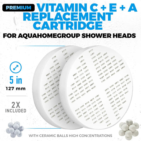 Vitamin C And Vitamin E Shower Filter Cartridge Two Pack Reduces Chlorine And Chloramine For Healthier Skin And Hair Keeps Your Shower Water Fresh And Gentle On Skin And Hair For All Skin Types, image of two white round replacement cartridges with detailed grids