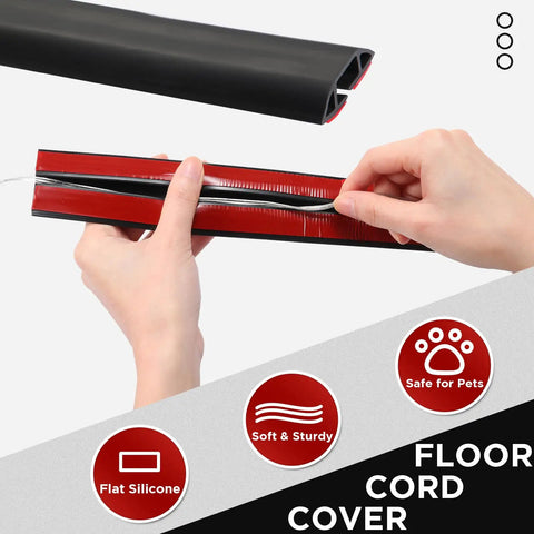 Hands inserting cable into 16 Ft Silicone Floor Cord Cover 2 Piece Set Cable Protector For Home Office And Garage Black Cut To Fit Design