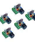 Five Badass 5 Piece AC Motor Speed Controller Set with smooth knobs and metal heatsinks for controlling 220V and 2000W loads.