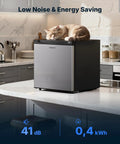 Compact Upright Freezer Delivering 1.1 Cu Ft Of Legit Cold Storage, featuring a sleek silver design with a cat resting on top.
