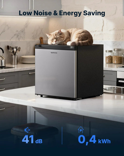 Compact Upright Freezer Delivering 1.1 Cu Ft Of Legit Cold Storage, featuring a sleek silver design with a cat resting on top.