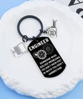 Engraved Engineer Keychain Gift For Men And Students, Cool Graduation Present For Engineers, Electrical Engineering Lovers Gift, Engineer Quote Keychain, Problem Solvers Pride, Perfect Everyday Accessory with charms on white plate.