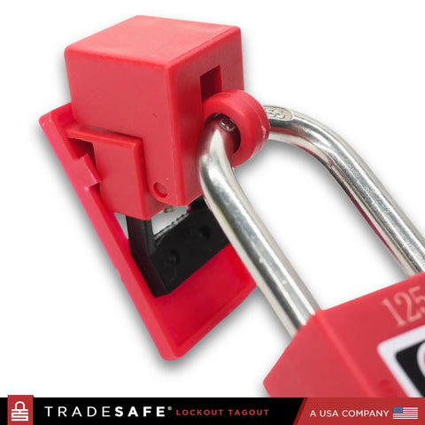 Close-up of red Clamp On Circuit Breaker Lockout Device Kit 10 Pack For 120/277 Volt Single Pole Toggles Up To 5/8 By 1/2 Inch OSHA Compliant.