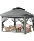 13x13 Pop Up Gazebo With Mosquito Netting One Push Setup No Tools Needed Ventilated Roof For Fresh Air Sturdy Frame Ideal For Patio Garden Or Backyard Dark Gray with seating and table inside