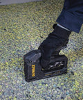 Carbon Fiber Body Workhorse 2 In 1 Staple Gun Tacker for Heavy Duty Staples and 18 Gauge Brads in use on upholstery.