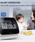 Slick Tabletop Dishwasher With Built In Water Tank And Clear Glass Front, showing plates inside with a family enjoying quiet operation.