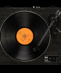 Dual CS429 Fully Automatic Belt Drive Turntable In Sleek Black with orange vinyl record in view, showcasing precise alignment and engineering.