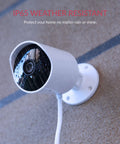 Two Pack Outdoor Security Camera Set 1080p Waterproof WiFi Smart Cams With Night Vision Motion Alerts Cloud Storage Smartphone App Alexa Compatible Front Door Surveillance System mounted on wall in rain.