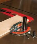 Kickass Table Saw Miter Gauge Featuring Twenty Seven Angle Stops For Dead Accurate Cuts And Zero Side Play Tuning on a wood table.