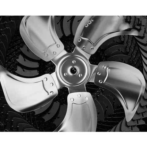 Heavy Duty Industrial Fan With Serious Breeze And Rock Solid Metal Build 45 Degree Tilt Rotary Controls close-up of metal fan blades.