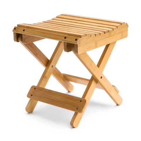 Foldable Shower Stool For Tiny Bathrooms Bamboo Foot Rest And Shaving Stool Space Saver Portable Folding Shower Bench Inside Shower Wooden Sauna Chair For Homes And RVs, shown in natural bamboo wood with slatted top and foldable legs.
