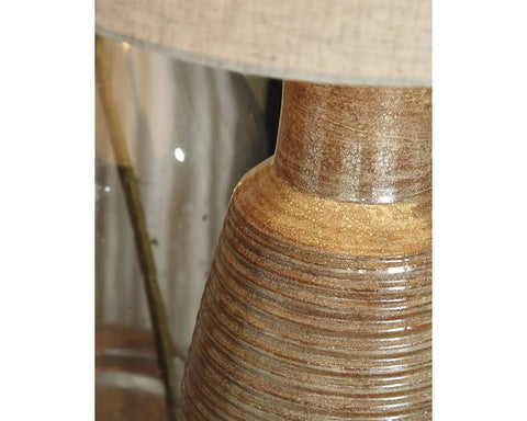Close-up of Casual 30 Inch Ceramic Table Lamp With Ribbed Texture In Terracotta Taupe And Brown Finish Elegant Lighting base