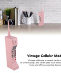 Kickass Vintage Cellphone Prop Cast From Heavy Duty Iron Serving Major Eighties Brick Phone Throwback Aesthetic on countertop.