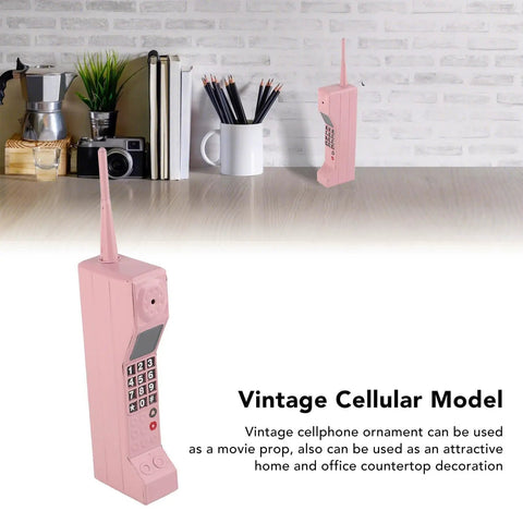 Kickass Vintage Cellphone Prop Cast From Heavy Duty Iron Serving Major Eighties Brick Phone Throwback Aesthetic on countertop.