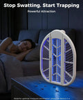 Foldable Electric Fly Swatter Racket With 4000V High Voltage, 1500mAh Rechargeable Battery, Dual Modes, Blue Light in use