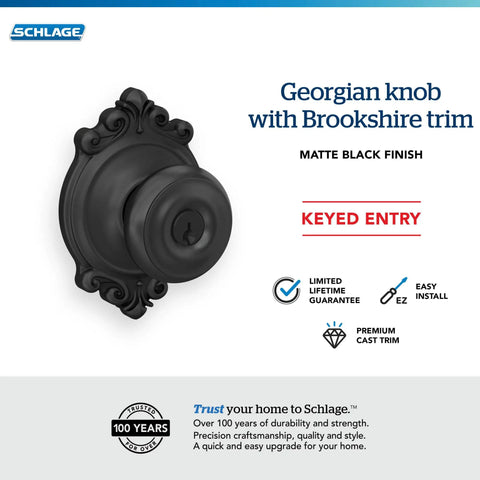 Georgian Door Knob With Brookshire Trim Keyed Entry Lock in Matte Black Finish, close-up view with classic detailing.