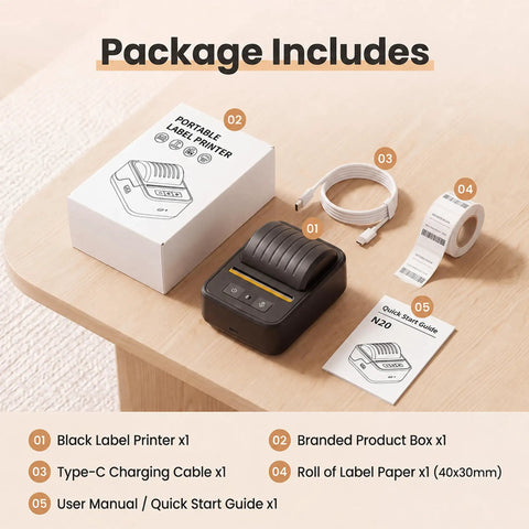 Awesome Bluetooth Label Maker Machine Printing On White Color Clear Thermal Labels With Tape For Home Business Organization Crisp Graphics No Ink Needed 2 Inch Wide Portable Handy Tech Gadget package contents on wooden table.