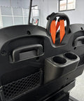 Backseat interior of Four Seater Electric Golf Cart With 14 Inch Off Road Tires And MacPherson Strut Suspension featuring cup holders.