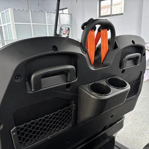 Backseat interior of Four Seater Electric Golf Cart With 14 Inch Off Road Tires And MacPherson Strut Suspension featuring cup holders.