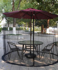 6Ft To 11Ft Patio Umbrella Mosquito Netting With Zipper Door Polyester Mesh Windproof And Portable Keeps Mosquitoes At Bay While You Chill Outdoors Under The Shade installed over outdoor table and chairs on patio
