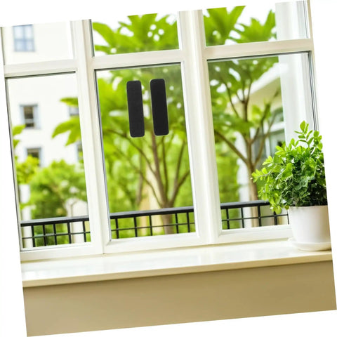Super Strong Double Sided Hook And Loop Strips 100 Count Black Pet Film Fasteners With Sticky Back on window for home organization.