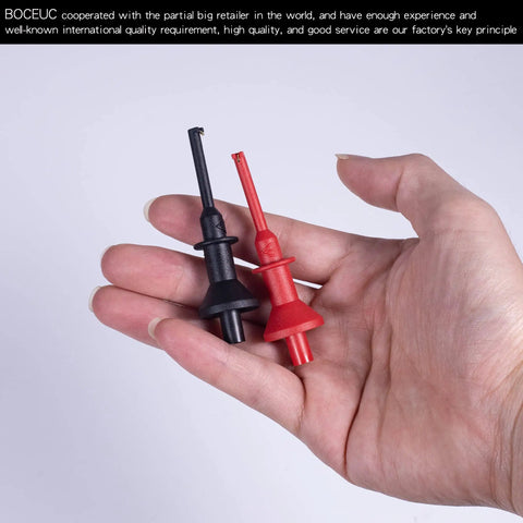 Hand holding 2mm Plug Test Hook Clips Set For Multimeter Probes, Durable Nickel Plated Brass Mini Test Lead Kit, Safe 600V CAT II