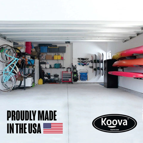 Heavy Duty Wall Mount Kayak Rack For Garage And Outdoor Storage Steel Shelf For Kayaks Stand Up Paddleboards Canoes Surfboards 150 Lb Capacity Horizontal Wall Rack Made In USA shown organizing garage.