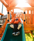 Children playing on a slide, showcasing 9 Inch Beech Wood Barn Door Pull Handle With Plastic Brackets Smooth Round Edges For Safe Kids.