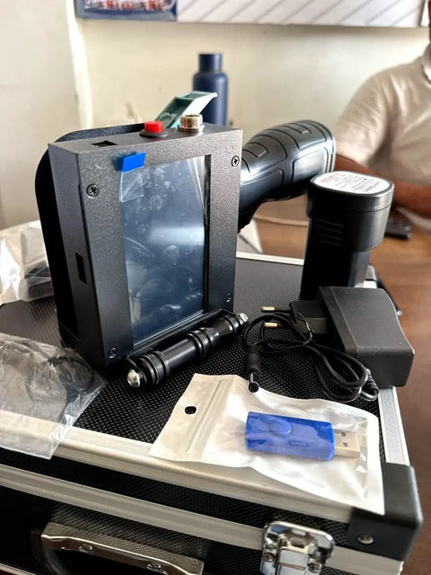 Hella Portable Handheld Inkjet Printer With Rechargeable Battery Tough Carry Case And Instant Print Setup for quick job site use, showing printer, charger, and accessories.