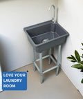 Easy Peasy Plastic Utility Sink Freestanding Laundry Tub 17 X 13 Inch Grey Slop Basin With Drain Opening For Garage Gym Or Basement Quick Rinse Finish in a laundry room corner.