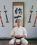 Vertical Katana Wall Mount Holder with adjustable tilt displaying swords, ideal for home decor in office or man cave setting.